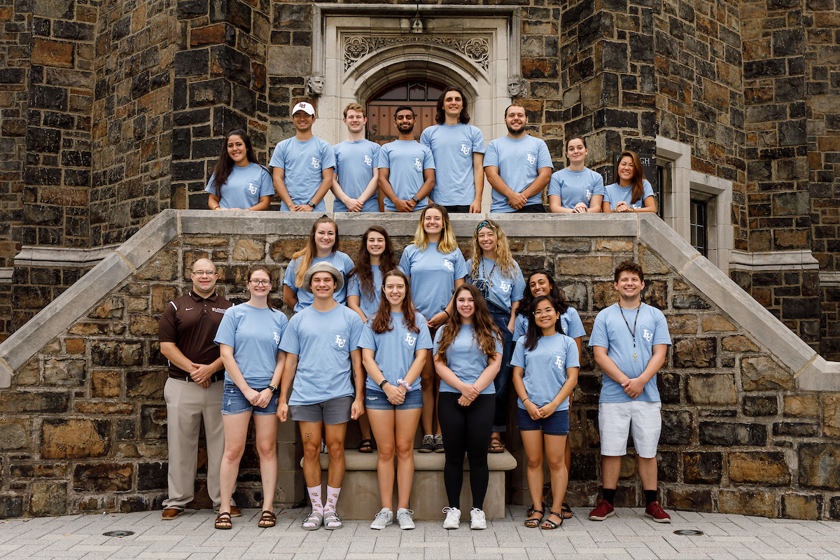 M&M and Drinker Gryphon Staff in front of the Alumni Memorial Building