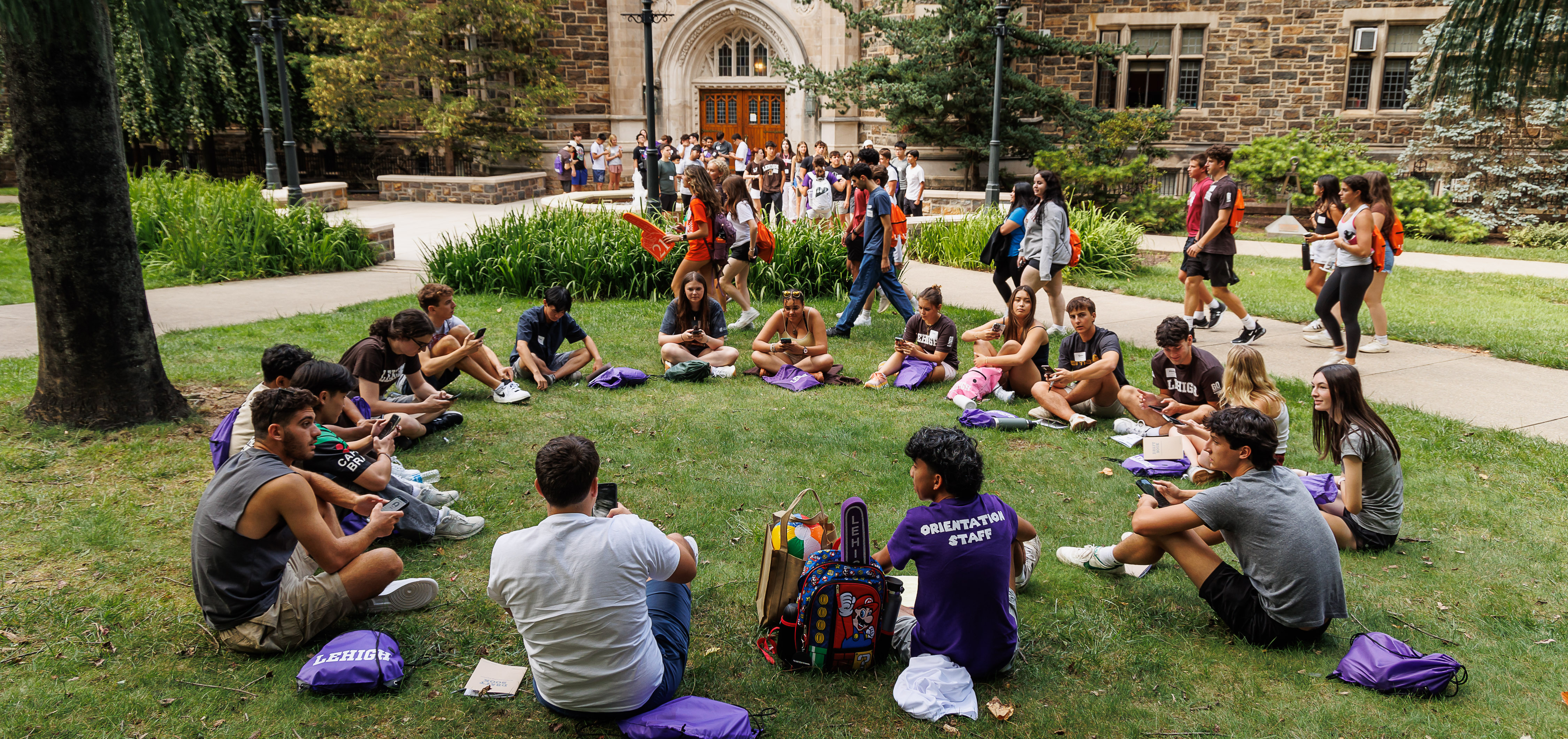 Orientation Group meeting outside on campus