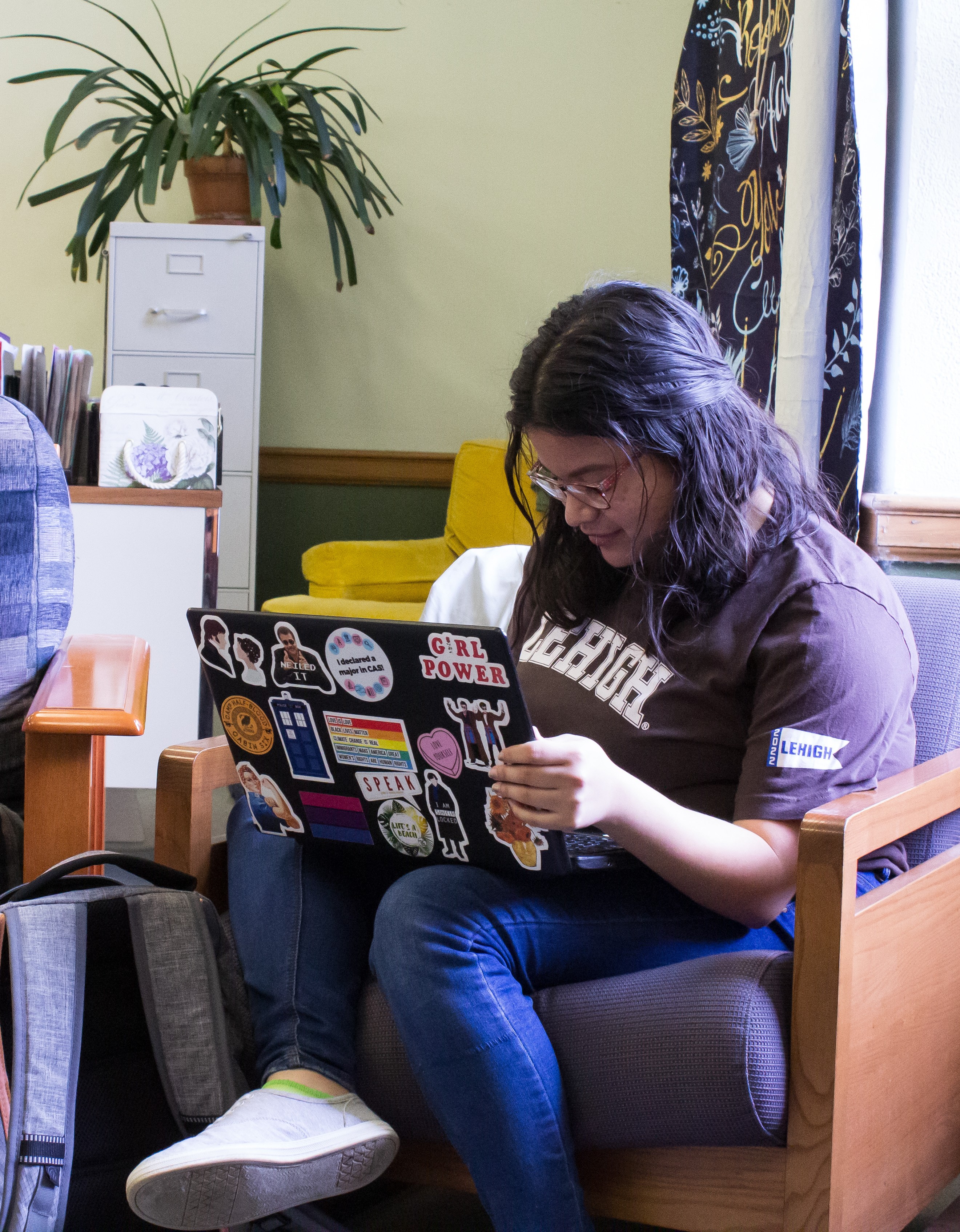 An image of one of work study students in the office at Drown Hall.