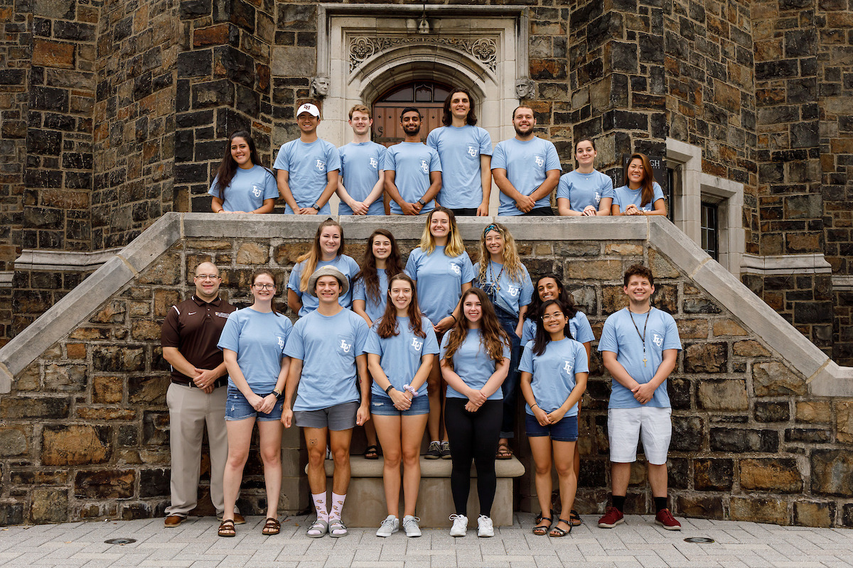 M&amp;M and Drinker Gryphon Staff in front of the Alumni Memorial Building