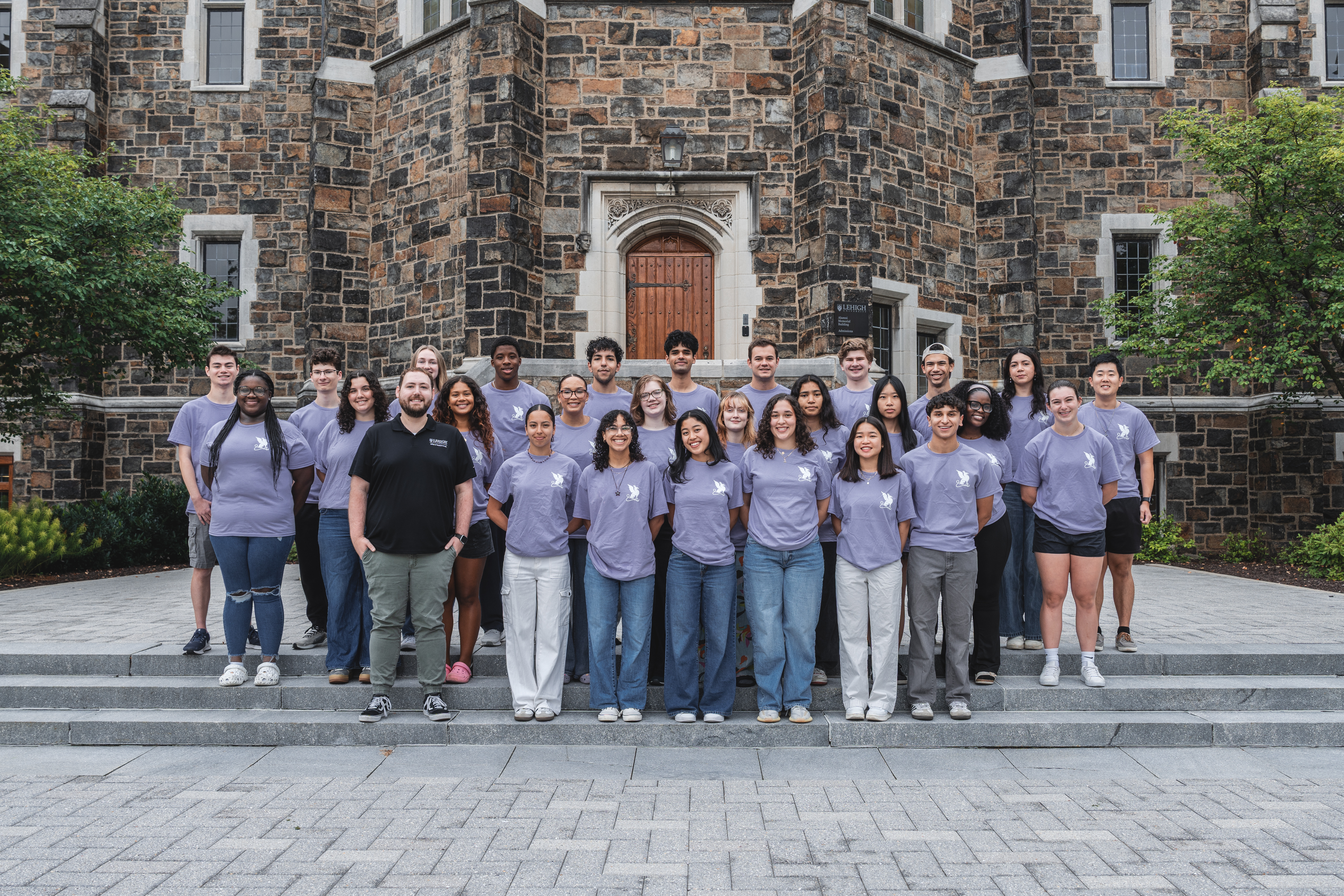 Group photo of SHM Gryphons and AD.