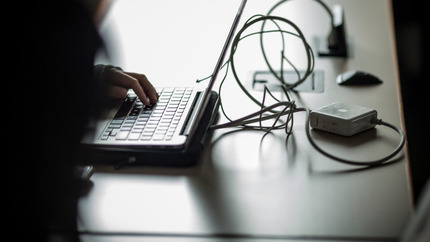 Student using laptop computer