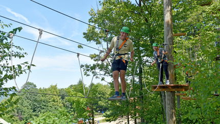 Leadership Adventure students on a ropes course