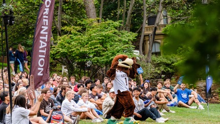 Mountain Hawk mascot, Clutch running through students at kick off