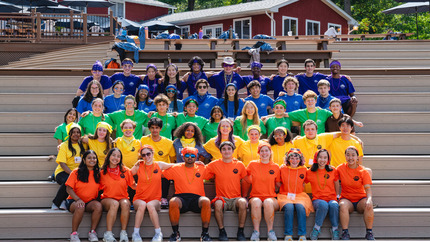 camp hawk participants in colorful shirts