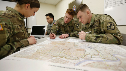 ROTC members doing a mapping exercise